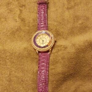 Elegant Women's Watch with Purple Strap and Gold Detailing